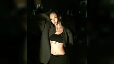 NINGNING de aespa, su atrevido tatuaje underboob y encanto chic revelados en Canada